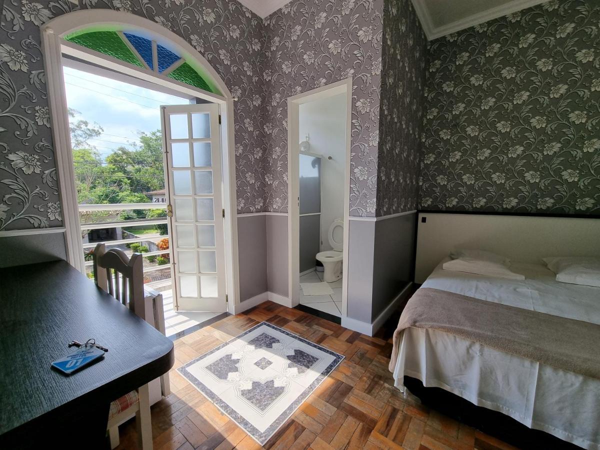 Urussanga Hotel Bagian luar foto